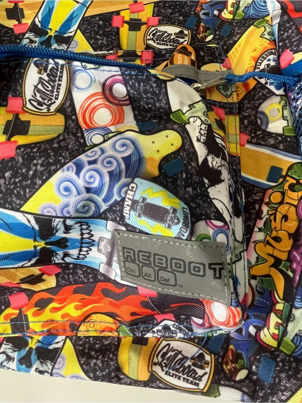 This Reboot Kids Blue Multi-Print Backpack - Fun Skateboard Pattern